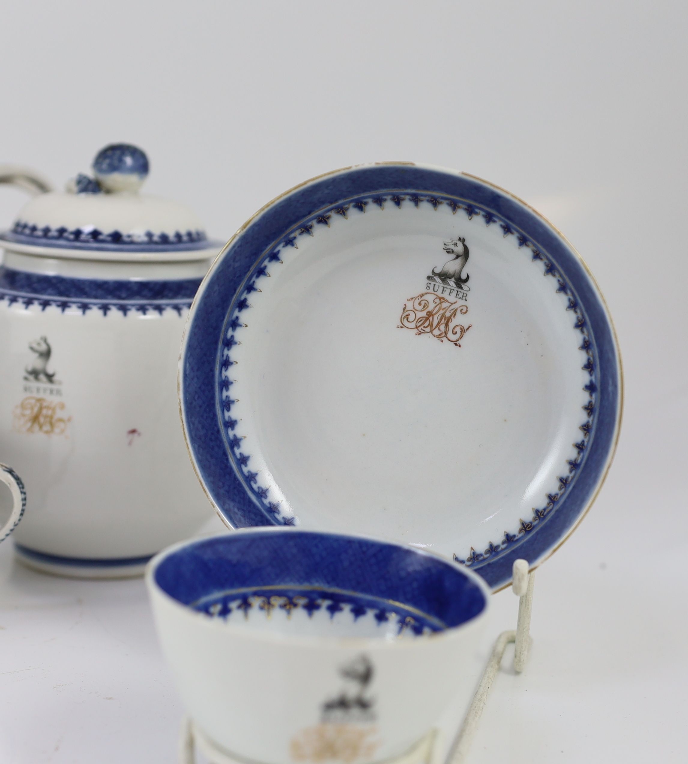 A Chinese export armorial forty two piece part tea service, late 18th century, decorated with the Haldane crest and motto 'Suffer'